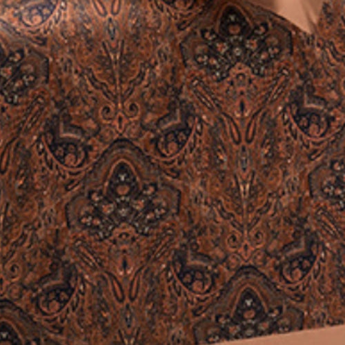 A close-up of a brown and black ornate paisley patterned fabric with a repeating symmetrical damask design.